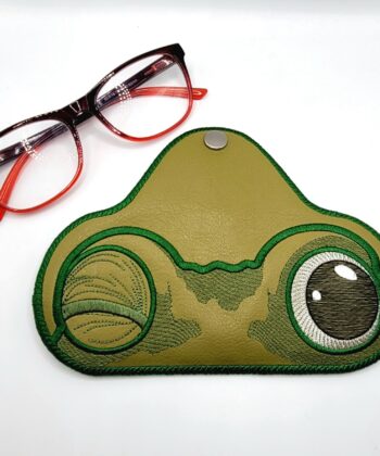 Cute handmade frog glasses case in green faux leather with embroidered frog face and snap closure